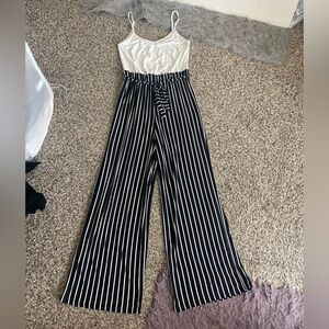 no comment Striped Black & White Wide-Leg Jumpsuit with Tie Waist